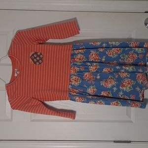 Dress Coral striped top, floral bottom.